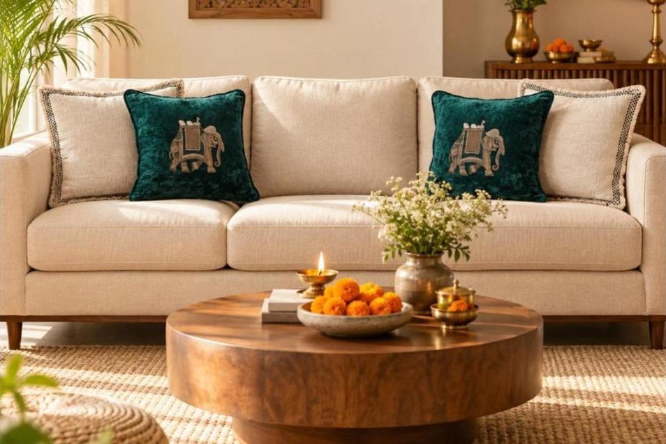 CREST zardozi elephant velvet cushion and SYLVEN kantha cushion on a linen sofa